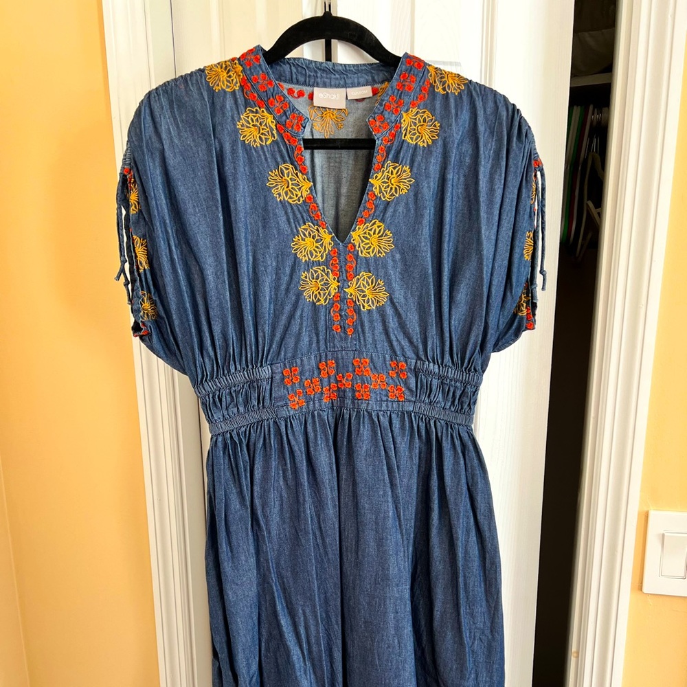 Blue chambray embroidered dress with floral motif. Approx size L.